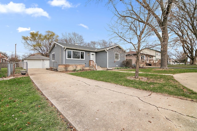 610 E Lemoyne Ave, Lombard, IL 60148 - view of front of home featuring an outbuilding, a front yard, fence, and a garage