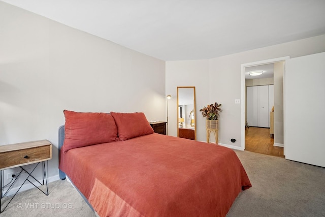222 E Pearson St Unit 409, Chicago, IL 60611 - carpeted bedroom featuring baseboards