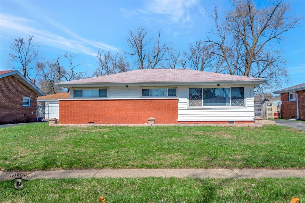 2906 Stafford Dr, Markham, IL 60428 - ranch-style house featuring brick siding, a front yard, and crawl space