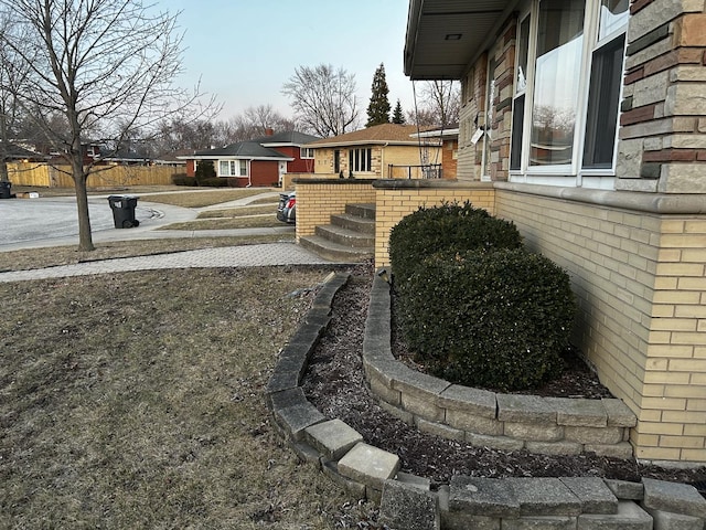 view of yard featuring a residential view