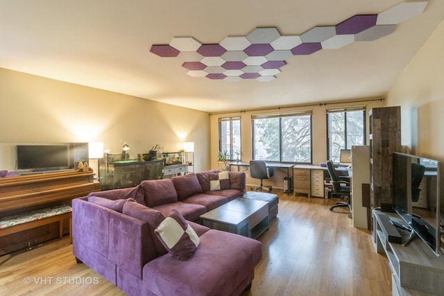 110 S Dunton Ave Unit 2A, Arlington Heights, IL 60005 - living area with a desk and light wood-style flooring
