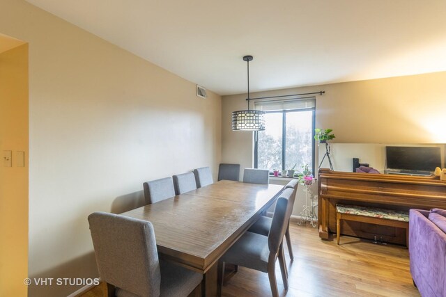 110 S Dunton Ave Unit 2A, Arlington Heights, IL 60005 - dining room featuring light wood-style flooring