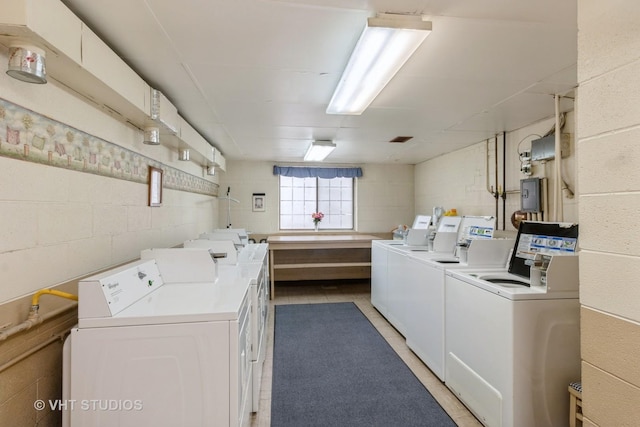 110 S Dunton Ave Unit 2A, Arlington Heights, IL 60005 - community laundry room featuring separate washer and dryer and concrete block wall