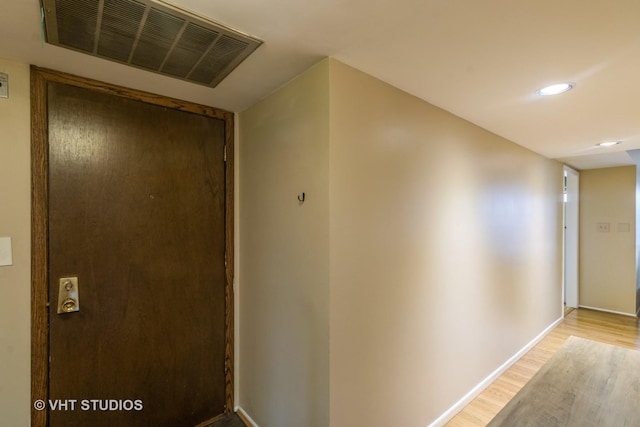 110 S Dunton Ave Unit 2A, Arlington Heights, IL 60005 - hallway featuring light wood-style flooring and recessed lighting