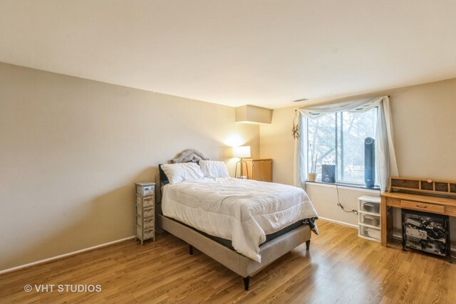 110 S Dunton Ave Unit 2A, Arlington Heights, IL 60005 - bedroom with light wood finished floors