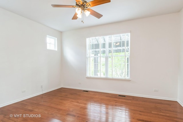 1177 Heathrow Ln, Aurora, IL 60502 - unfurnished room featuring wood finished floors and ceiling fan