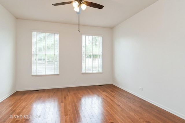 1177 Heathrow Ln, Aurora, IL 60502 - unfurnished room featuring ceiling fan and hardwood / wood-style floors
