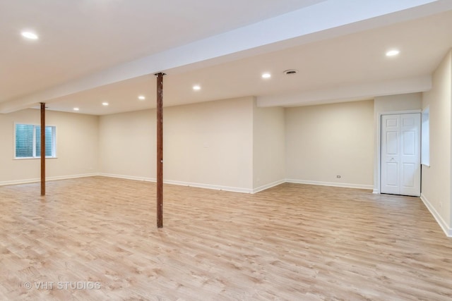 1177 Heathrow Ln, Aurora, IL 60502 - below grade area with light wood-style flooring and recessed lighting