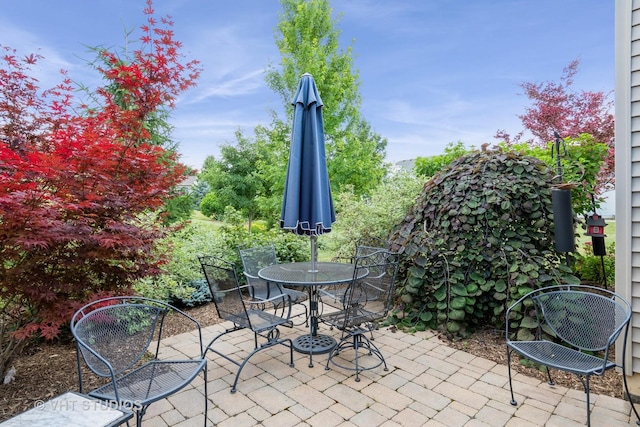 1177 Heathrow Ln, Aurora, IL 60502 - view of patio / terrace featuring outdoor dining area