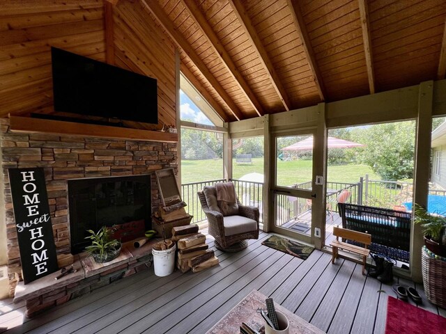 38W715 Bonnie Ct, Saint Charles, IL 60175 - sunroom / solarium featuring a fireplace and beam ceiling