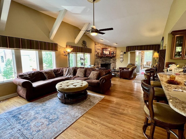 38W715 Bonnie Ct, Saint Charles, IL 60175 - living area featuring high vaulted ceiling, a fireplace, light wood-style flooring, and ceiling fan
