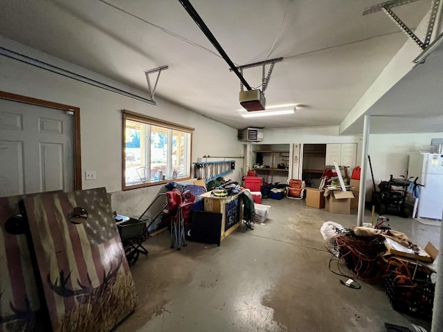 38W715 Bonnie Ct, Saint Charles, IL 60175 - garage featuring a garage door opener and freestanding refrigerator