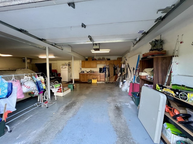 38W715 Bonnie Ct, Saint Charles, IL 60175 - garage with a garage door opener and freestanding refrigerator