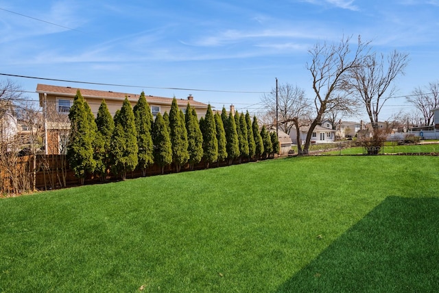 view of yard with fence