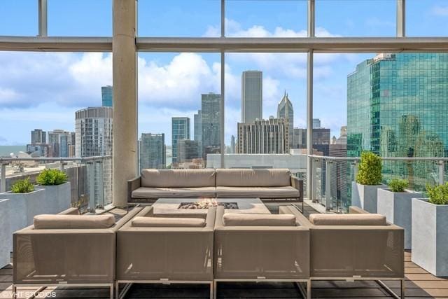 living room featuring a view of city and expansive windows