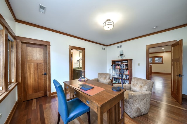 office space with dark wood-style floors, ornamental molding, and baseboards