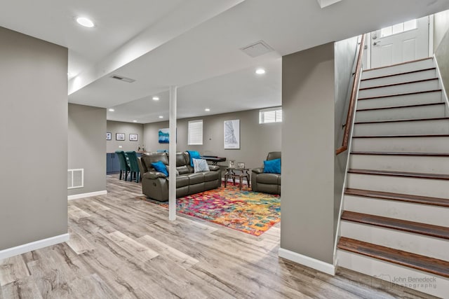 living room with visible vents, recessed lighting, stairway, wood finished floors, and baseboards