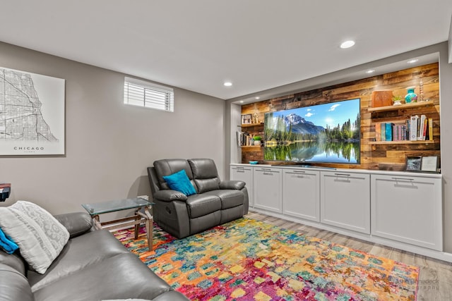 living room with recessed lighting and light wood-style floors