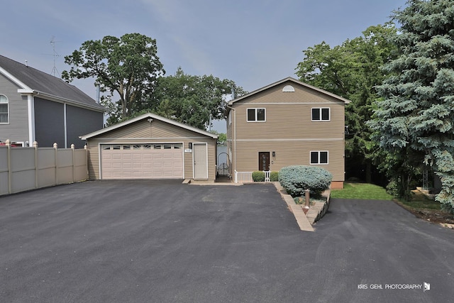 536 Circle Dr, Fox Lake, IL 60020 - view of front of house featuring a garage and an outdoor structure
