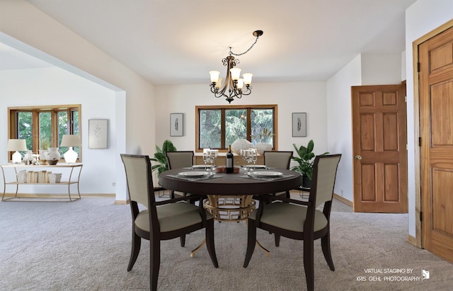 536 Circle Dr, Fox Lake, IL 60020 - dining room featuring a chandelier, light colored carpet, and healthy amount of natural light