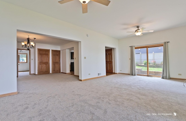 536 Circle Dr, Fox Lake, IL 60020 - unfurnished living room with ceiling fan, a chandelier, and light carpet