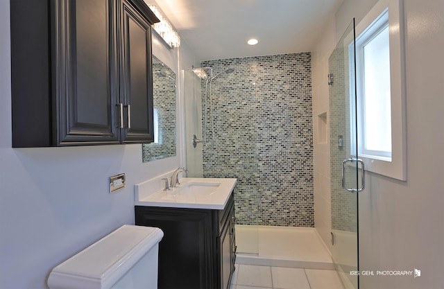 536 Circle Dr, Fox Lake, IL 60020 - bathroom featuring a shower stall, vanity, tile patterned flooring, and recessed lighting