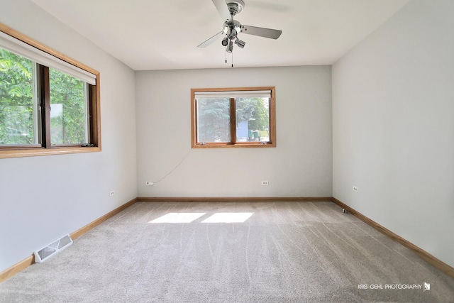 536 Circle Dr, Fox Lake, IL 60020 - carpeted empty room with ceiling fan and baseboards