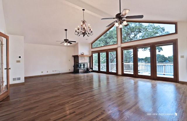 536 Circle Dr, Fox Lake, IL 60020 - unfurnished living room with ceiling fan, a fireplace, high vaulted ceiling, wood finished floors, and beam ceiling