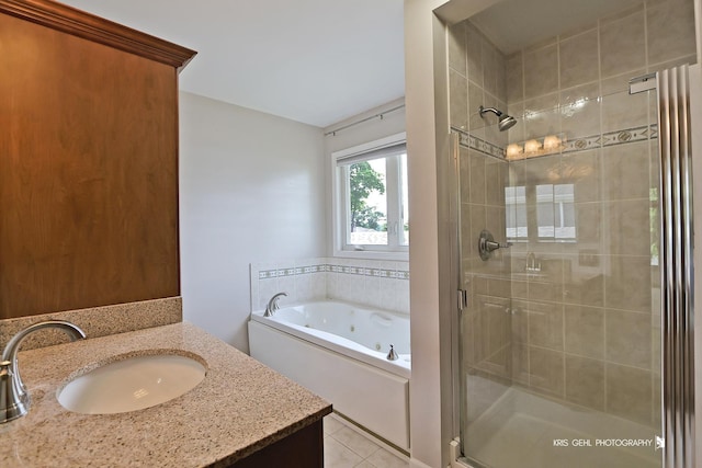536 Circle Dr, Fox Lake, IL 60020 - full bathroom with a shower stall, a whirlpool tub, vanity, and tile patterned flooring