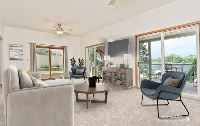536 Circle Dr, Fox Lake, IL 60020 - living area with ceiling fan, light carpet, and healthy amount of natural light