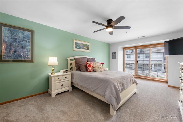 bedroom with carpet floors, a ceiling fan, baseboards, and visible vents