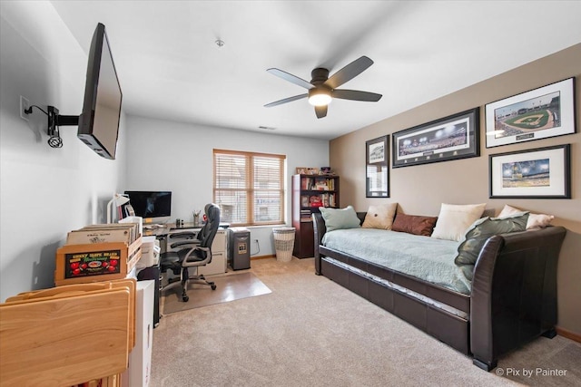 bedroom featuring carpet flooring, a ceiling fan, and visible vents