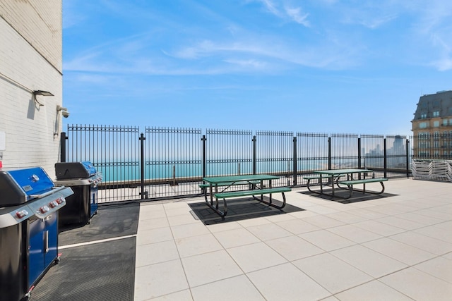 view of patio / terrace featuring fence and area for grilling