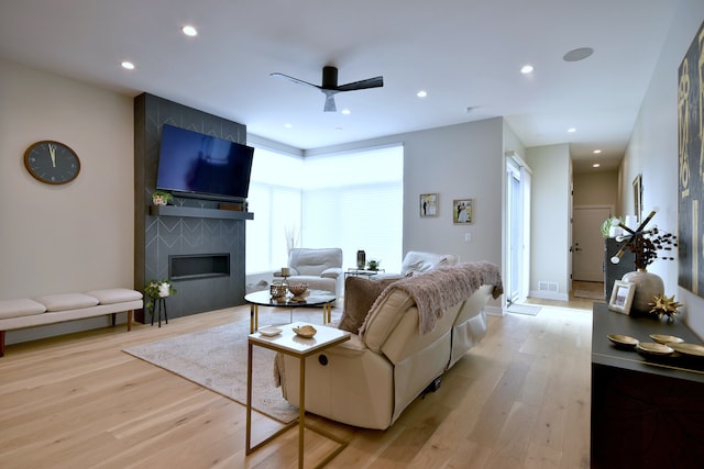 262 N Addison Ave, Elmhurst, IL 60126 - living room featuring light wood-type flooring, ceiling fan, a large fireplace, and recessed lighting