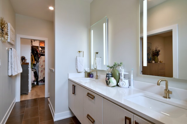 262 N Addison Ave, Elmhurst, IL 60126 - full bath with double vanity, tile patterned floors, and a spacious closet
