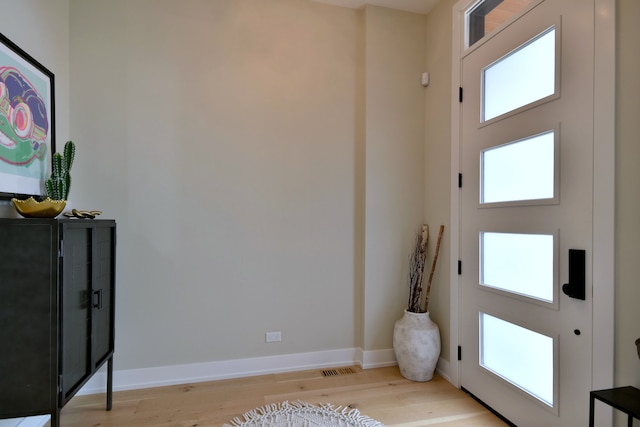 262 N Addison Ave, Elmhurst, IL 60126 - foyer entrance featuring light wood-type flooring and baseboards