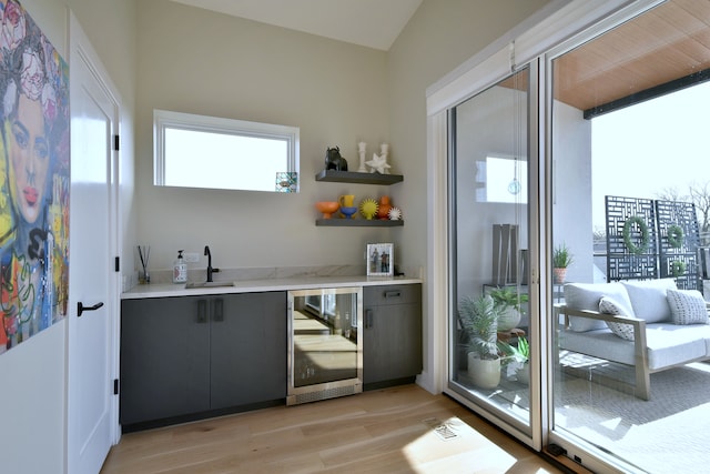 262 N Addison Ave, Elmhurst, IL 60126 - indoor wet bar with beverage cooler and light wood finished floors