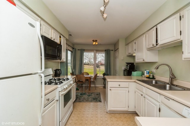 1198 Streamwood Ln Unit 1198, Vernon Hills, IL 60061 - kitchen with light countertops, white cabinetry, a sink, and white appliances