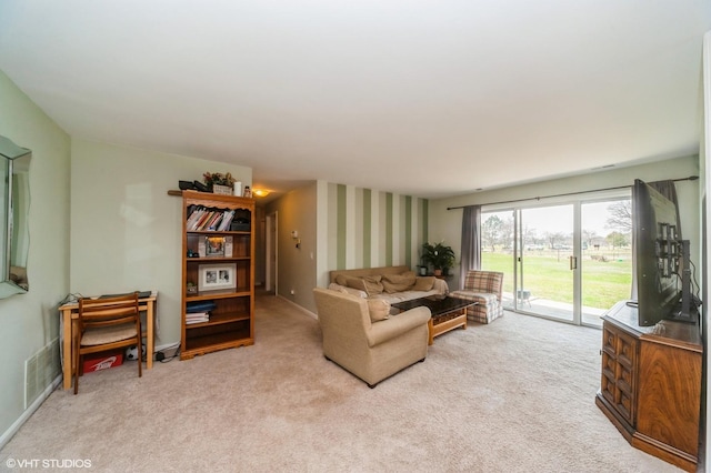 1198 Streamwood Ln Unit 1198, Vernon Hills, IL 60061 - living area featuring visible vents, baseboards, light carpet, and wallpapered walls