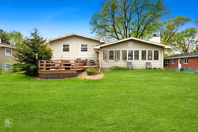 632 Columbine Ave, Lisle, IL 60532 - rear view of property featuring a deck, a lawn, and a chimney