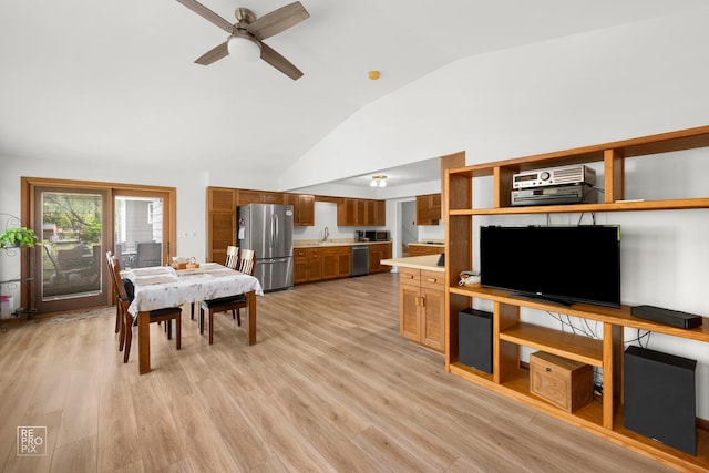 632 Columbine Ave, Lisle, IL 60532 - living room featuring vaulted ceiling, a ceiling fan, and light wood-style floors