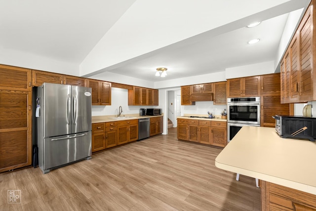 632 Columbine Ave, Lisle, IL 60532 - kitchen featuring stainless steel appliances, a sink, brown cabinets, light countertops, and recessed lighting