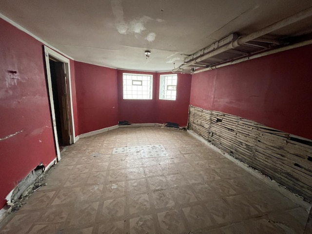 basement with tile patterned floors