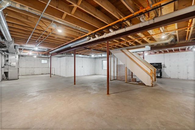 below grade area with plenty of natural light and stairs