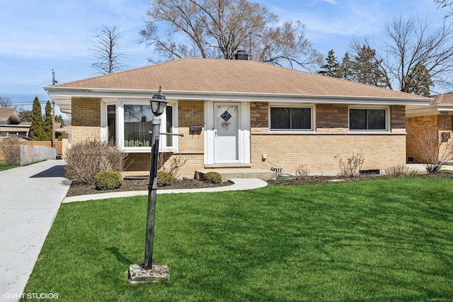 view of front facade with concrete driveway, brick siding, a chimney, and a front lawn