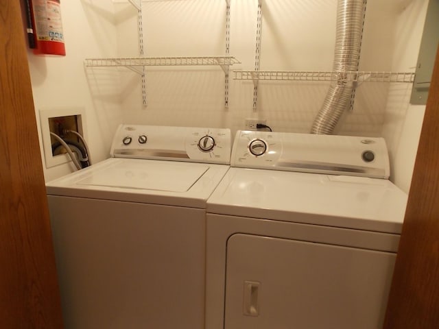 laundry area with washing machine and dryer and laundry area