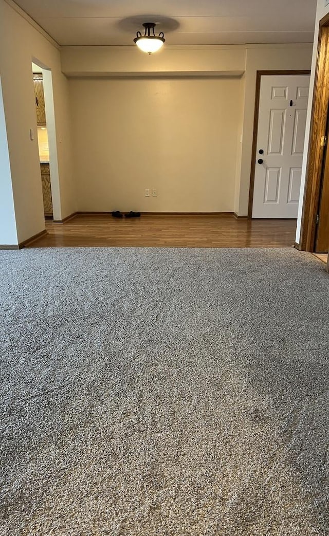 empty room featuring wood finished floors