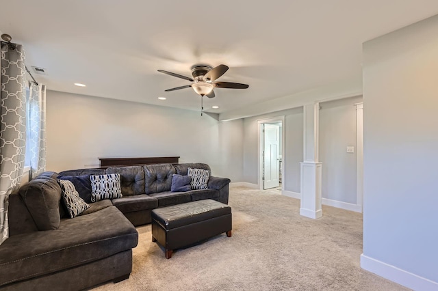 living area with light colored carpet, a ceiling fan, visible vents, recessed lighting, and baseboards
