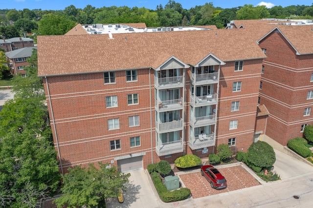 17 E Hattendorf Ave Unit 205, Roselle, IL 60172 - view of property with concrete driveway and a garage