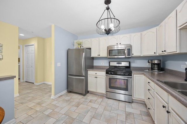 17 E Hattendorf Ave Unit 205, Roselle, IL 60172 - kitchen featuring stainless steel appliances, hanging light fixtures, recessed lighting, a chandelier, and white cabinets